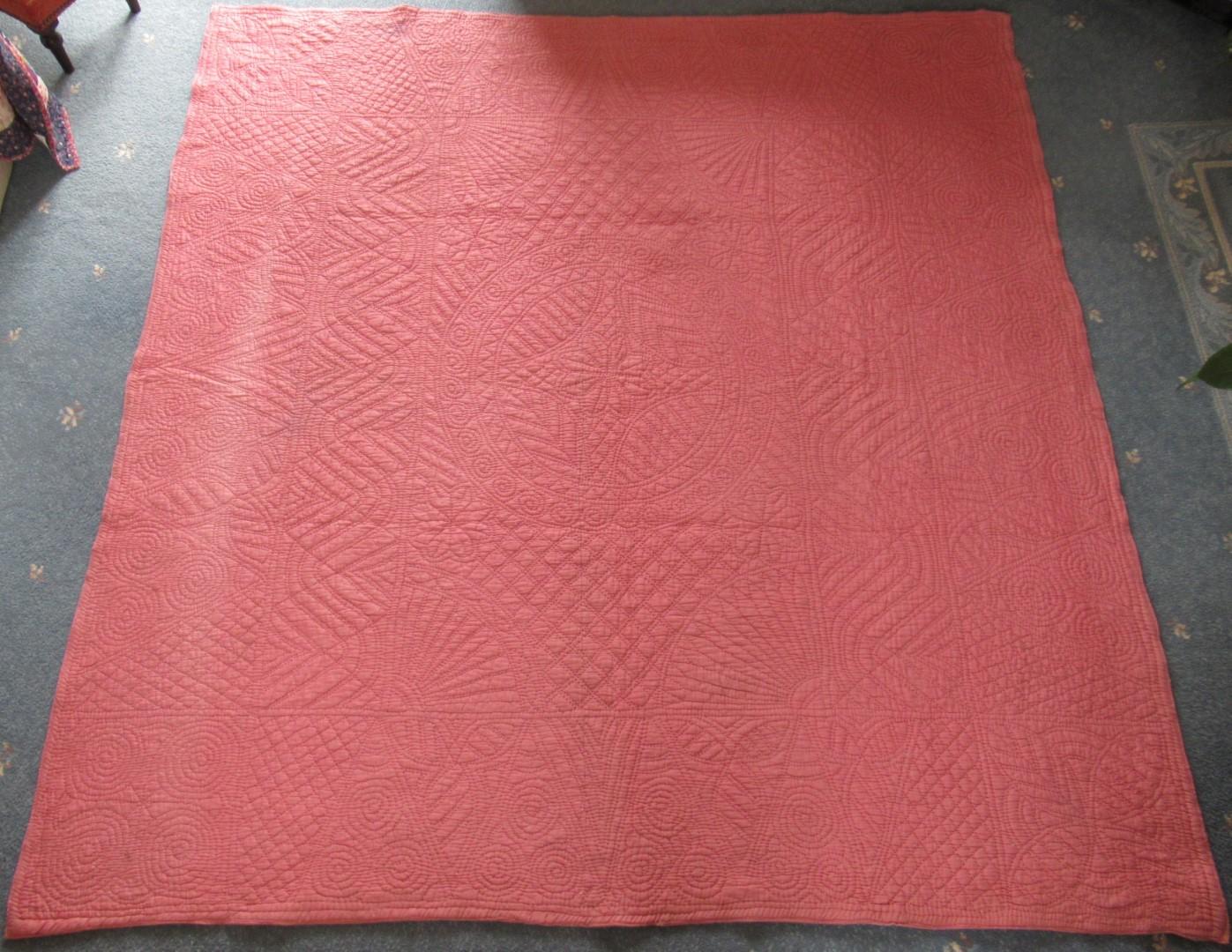 The whole of a pink quilt