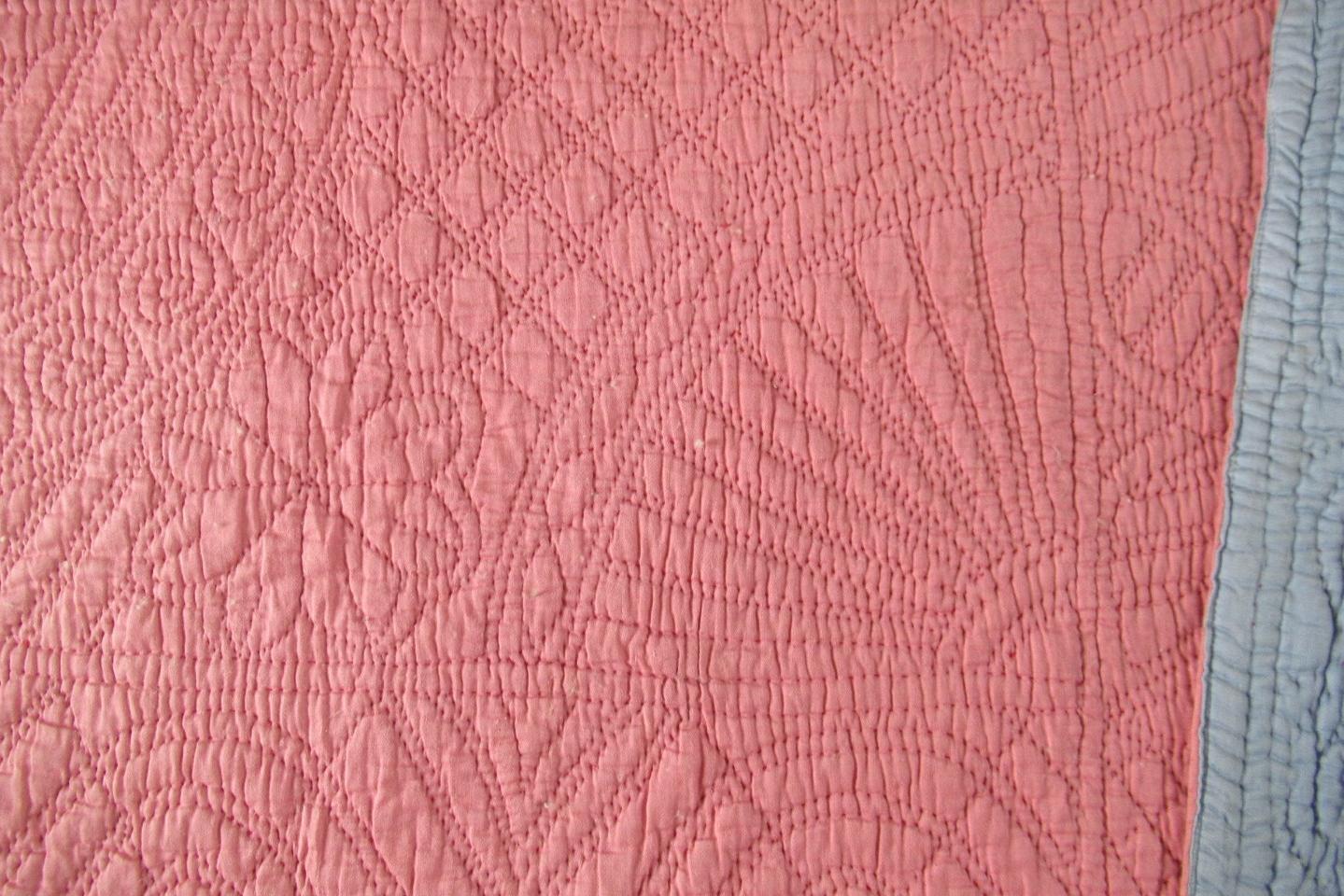 Pink quilt detail of quilting