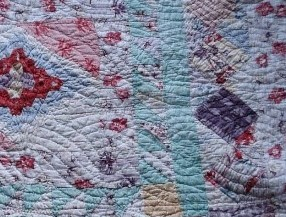 Multi coloured quilt detail