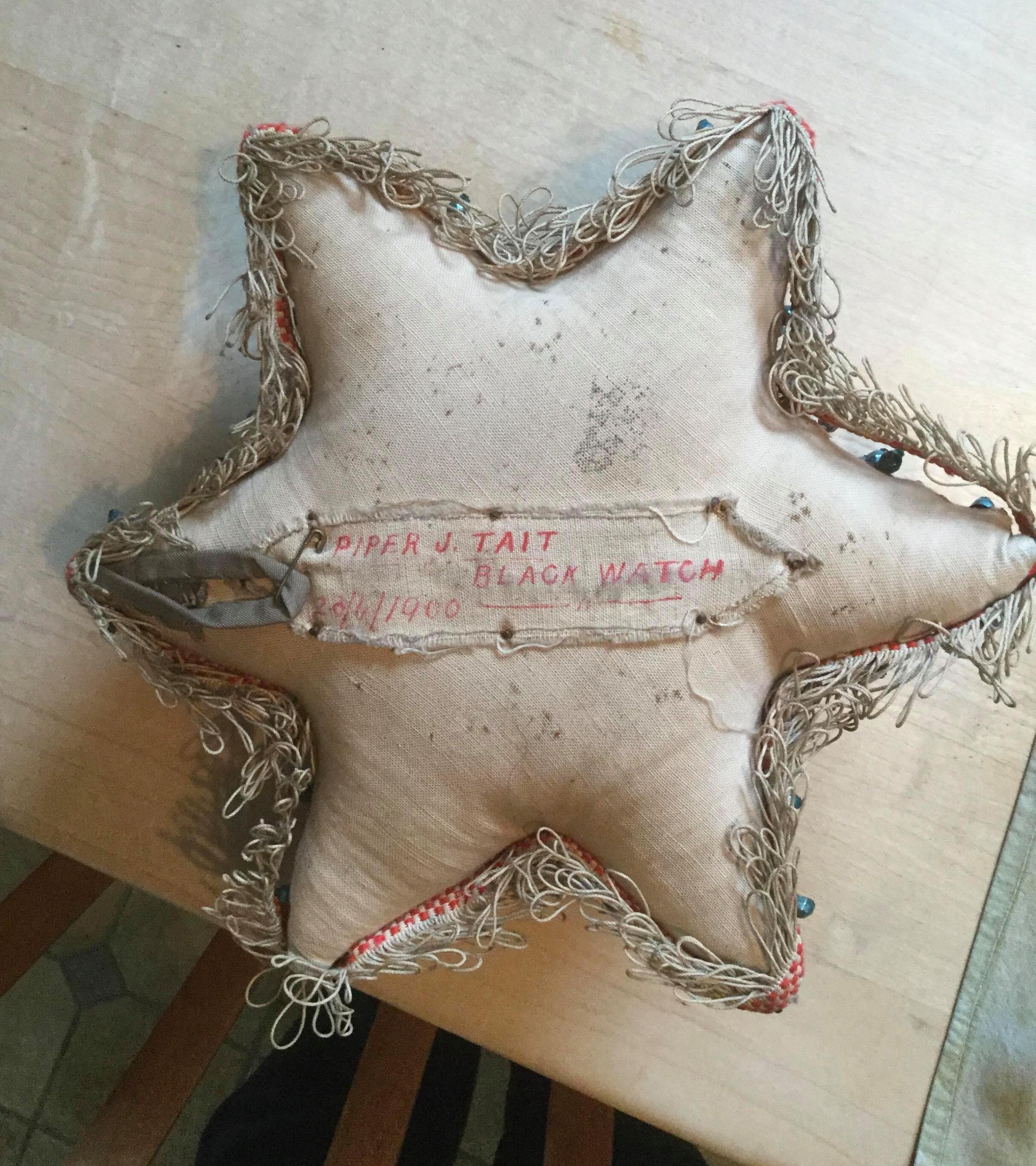 Cream star shaped cushion