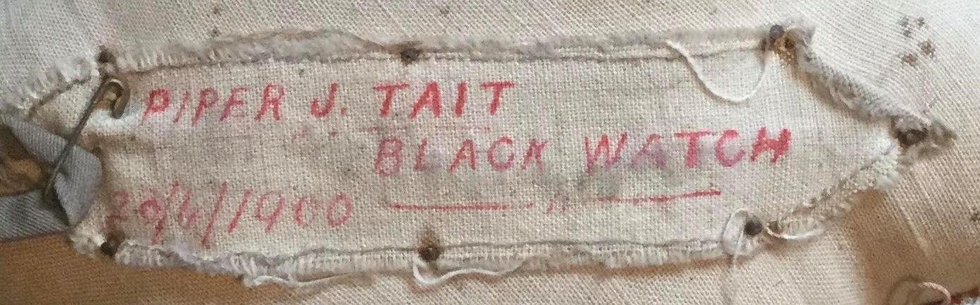 cream label with red writing