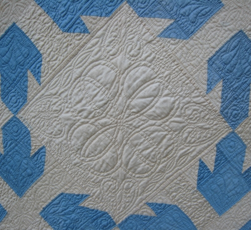 White quilted centre with blue