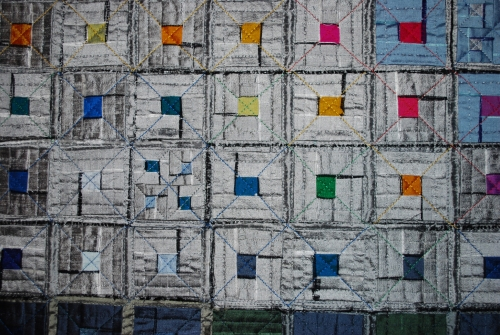 blocks in greys with coloured centres