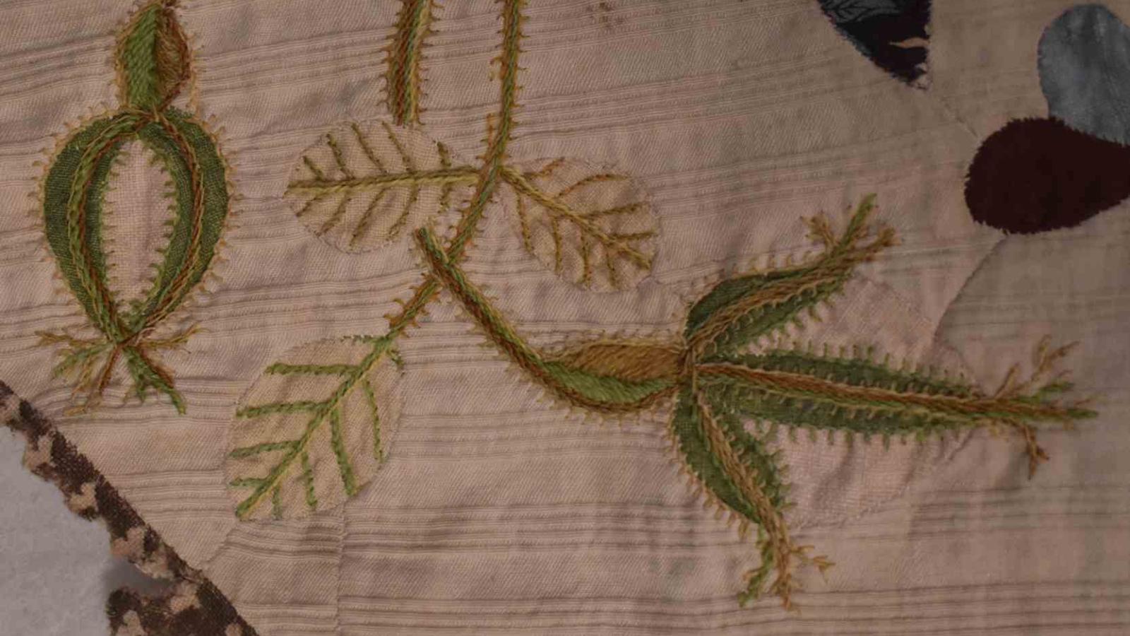 Embroidered leaves in green and brown