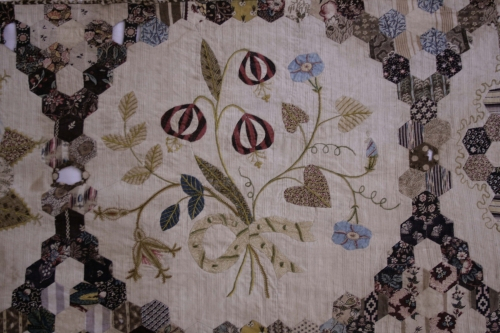 Flowers tied with a bow on cream background