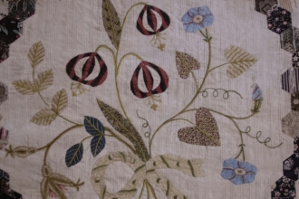 Patchwork of Flowers tied with a bow