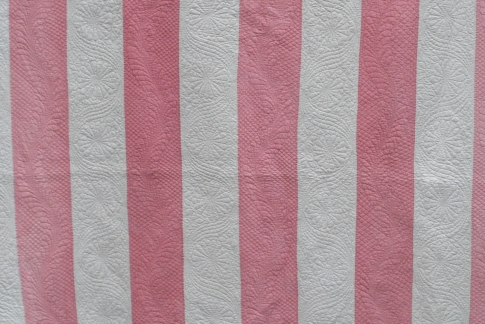 Pink and white strippy quilt deatil
