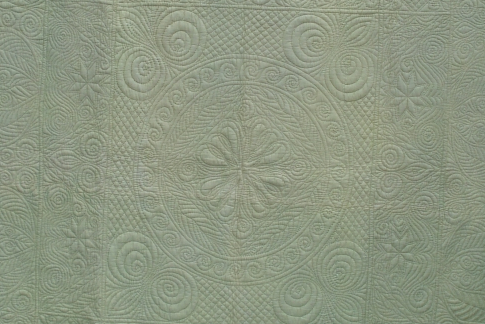Cream quilt detail of stitching