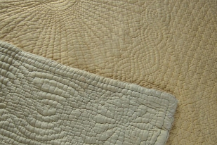 Cream and pale yellow quilt detail