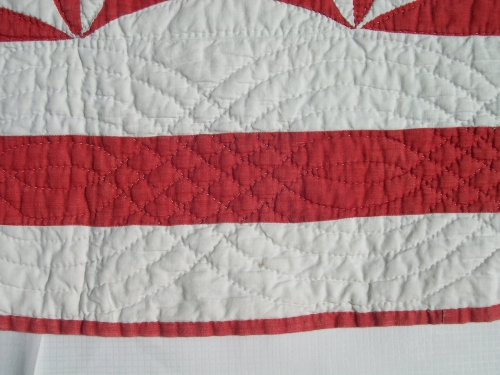 Red and white quilt