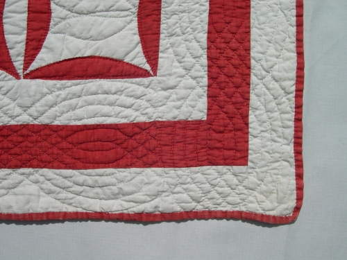 Red and white quilt corner