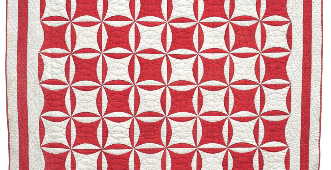 Red and white patchwork quilt