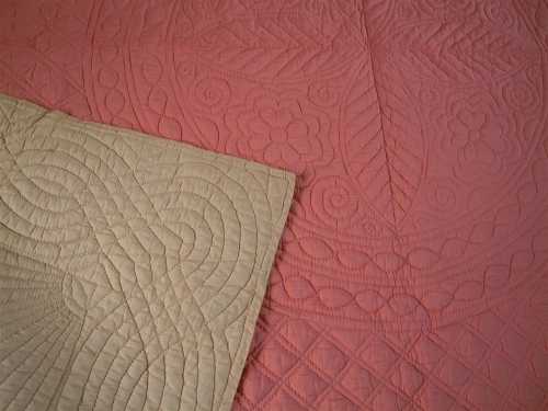 Cream corner folded over peach quilt