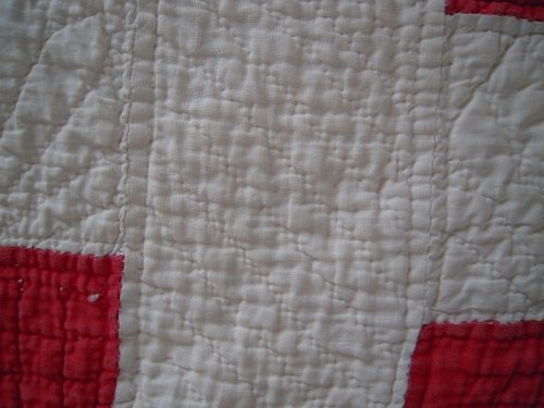 Red and white quilt detail