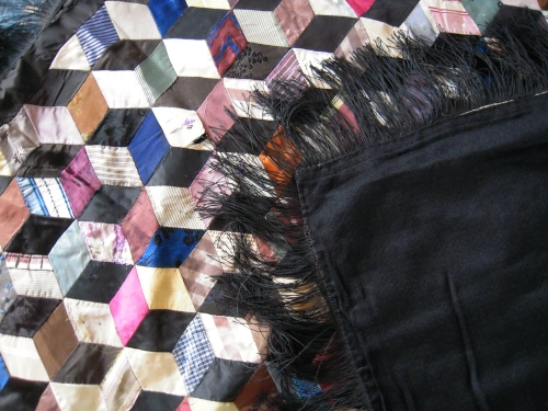 Multicoloured tumbling blocks with black corner turned over