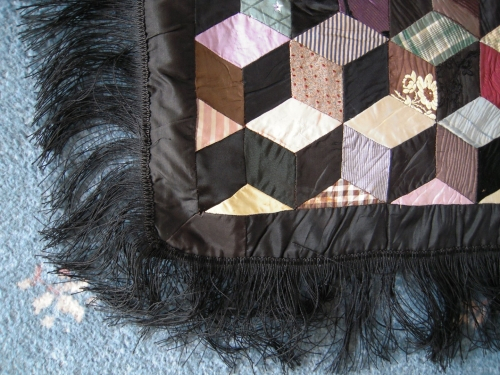 Corner of patchwork with fringe