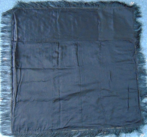 Black quilt reverse with fringe