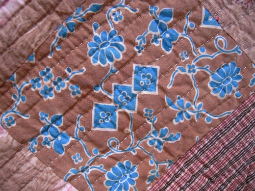 Brown fabric with blue flowers