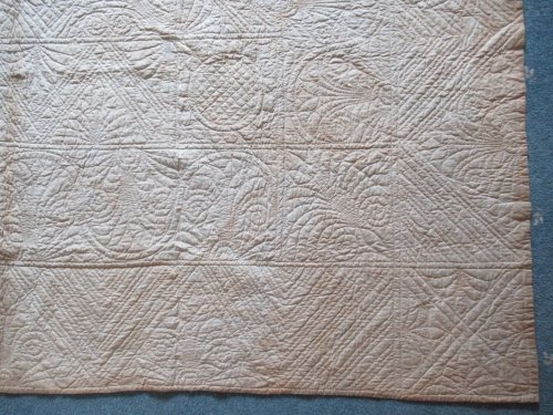 Corner of white quilt