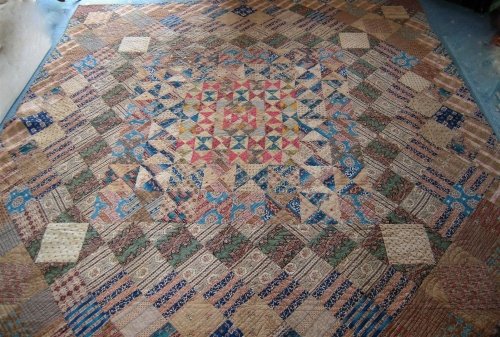 Patchwork quilt in blues and browns