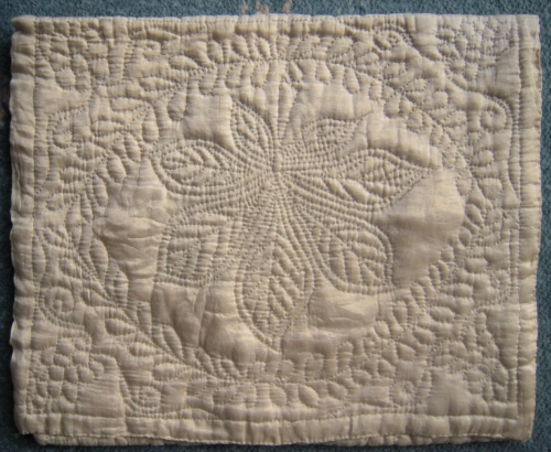Cream case with leaf stitching