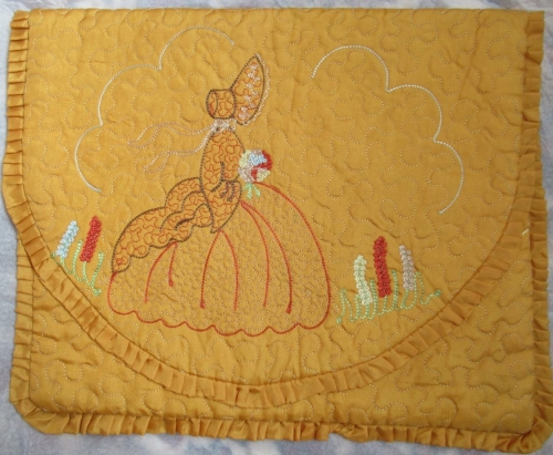 Yellow case with machine stitched crinoline lady