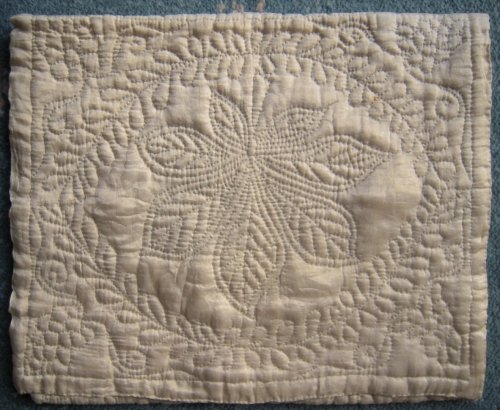 Cream case with leaf stitching