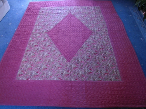 Pink quilt with diamond centre