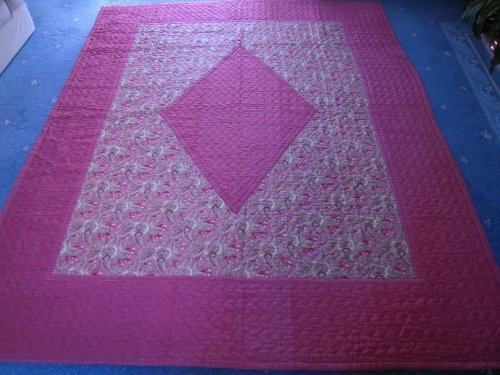 Pink quilt with diamond centre
