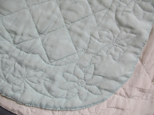 Blue bedcape detail of front