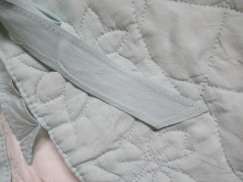 blue bedcape deatil of ties