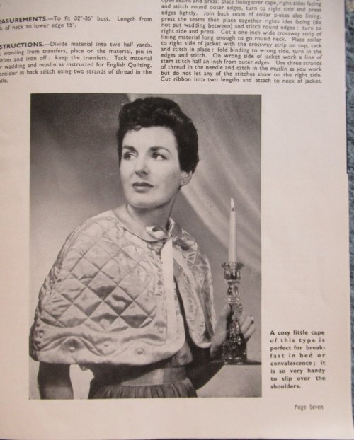 booklet photo of lady wearing cape