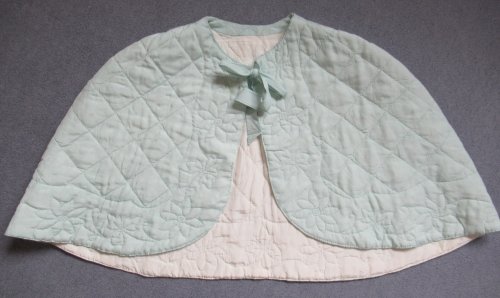 Pale blue bedcape with cream lining