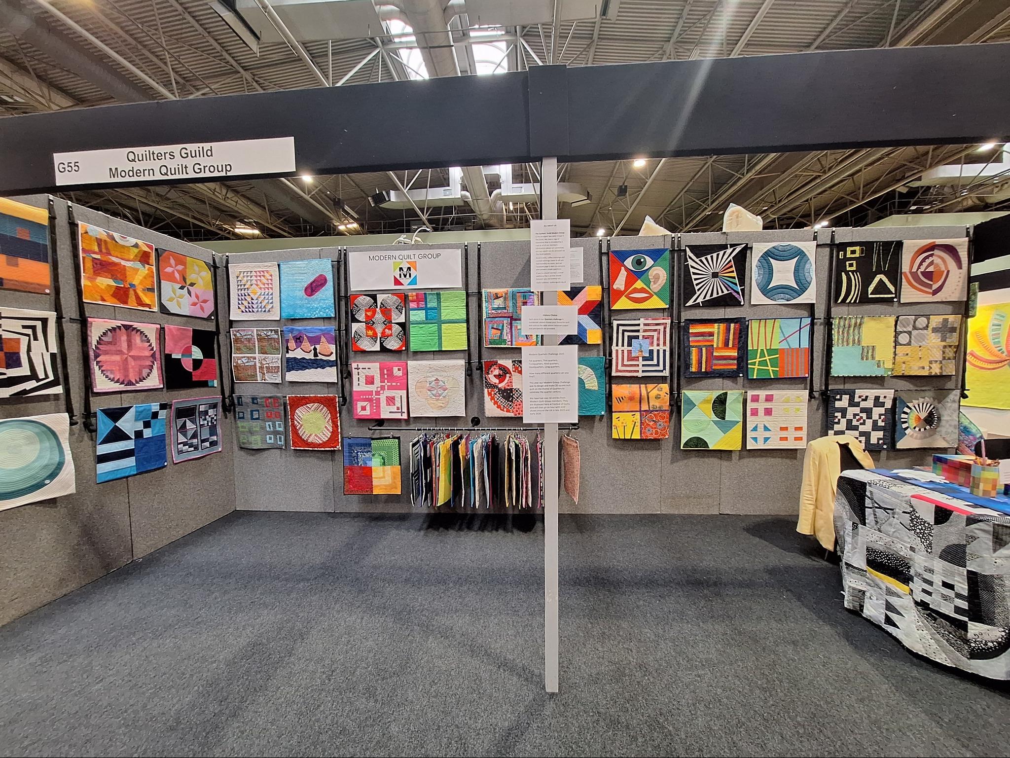 Modern Quilt Groups Gallery space at Festival of Quilts 2025 with challenge entries on display