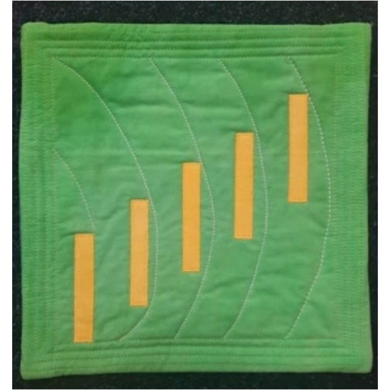 A square quilt with a green background. The quilt features a series of yellow, vertical lines of varying lengths, arranged in a staggered pattern. The background is quilted with curved lines, creating a sense of depth and movement.