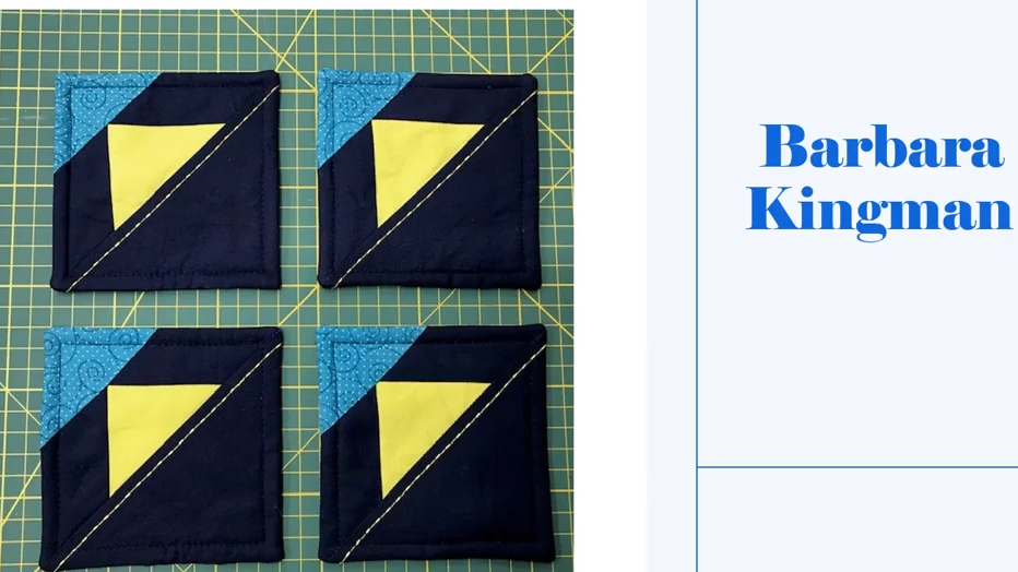 Four square coasters with a blue background and a yellow triangle in the corner. The coasters have a blue border.