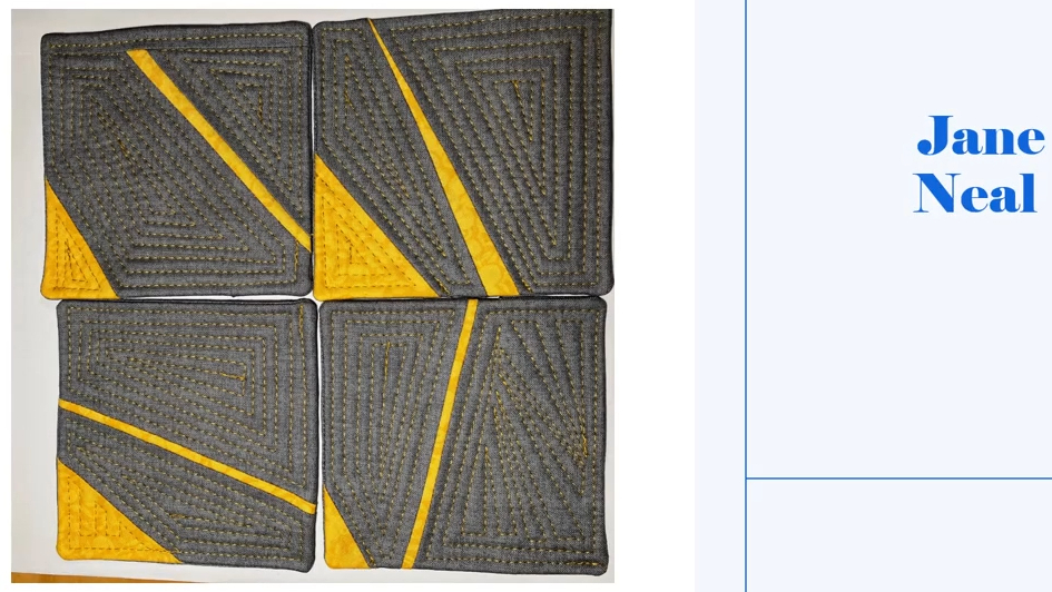Four square coasters with a gray background and a yellow border. Each coaster features a yellow line or shape on the grey background. The background is quilted with a linear pattern.