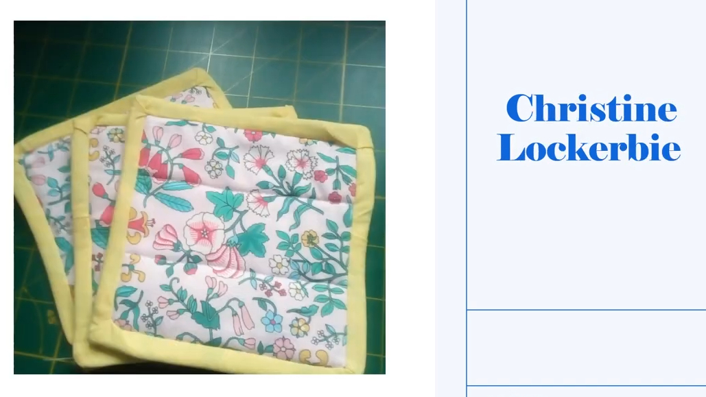 Three square coasters with a white background and a yellow border. The coasters feature a floral pattern in shades of pink, green, and blue. 