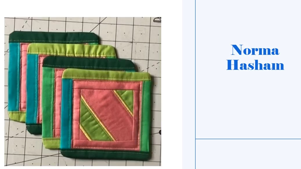 Four square coasters with a green border. Each coaster features a colorful, geometric design with squares and triangles in shades of pink, green, and yellow.