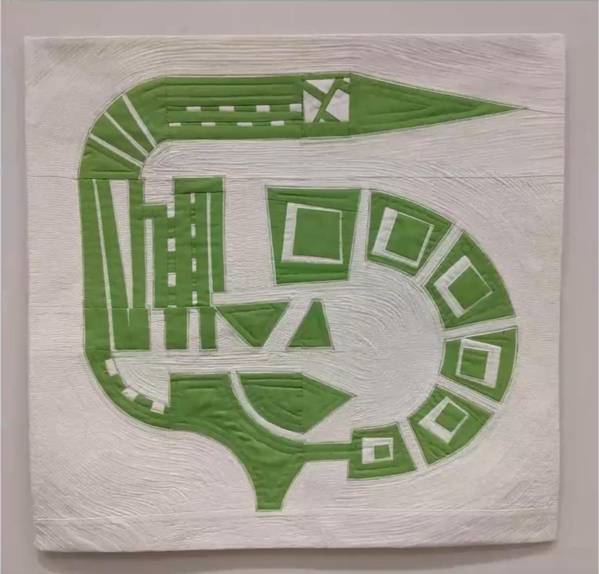 Improv quilt piece in the style of Irene Roderick dancing with the wall in green and white