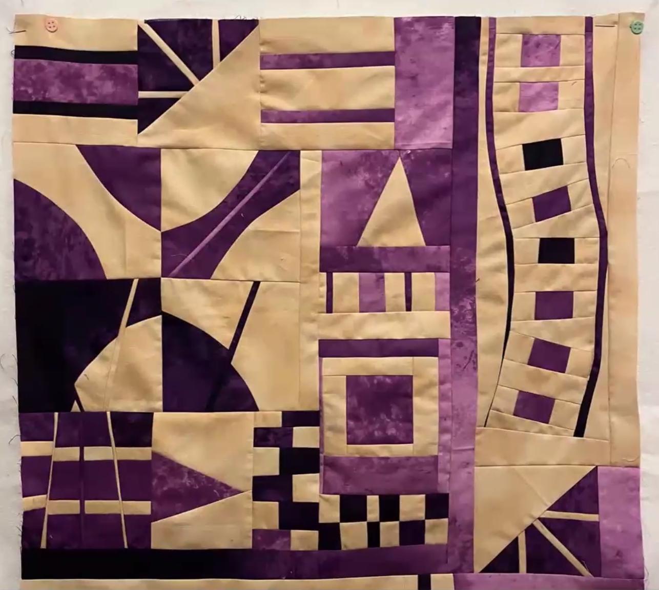 Improv quilt piece in the style of Irene Roderick dancing with the wall in purple and cream