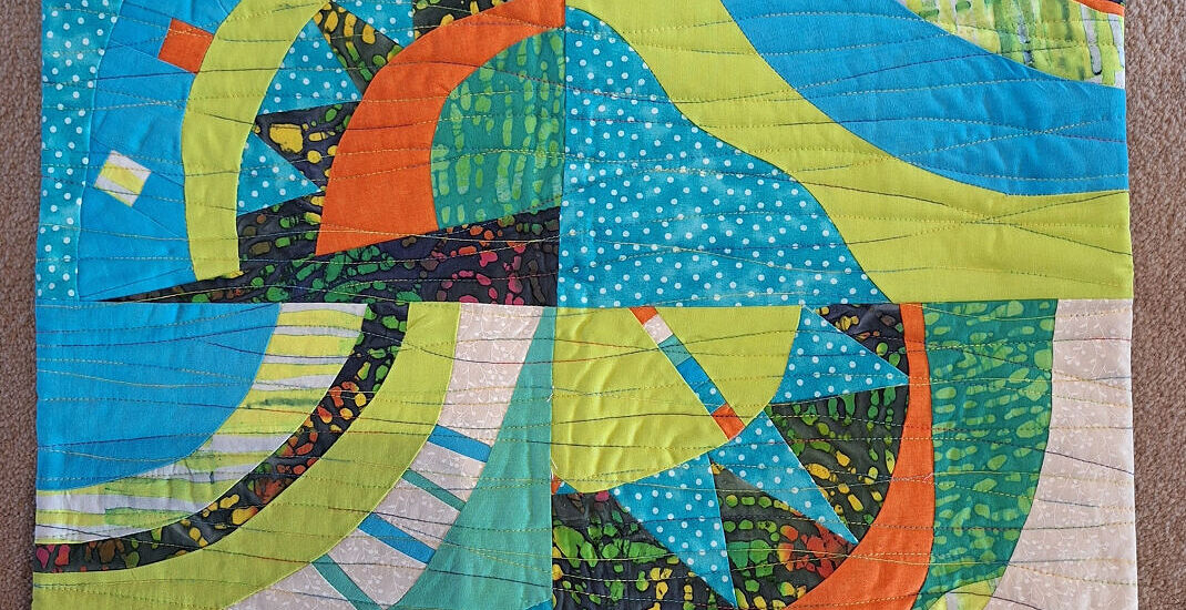 Blocks made by Shirley Collie during the Fabulous Freehand Curves Cindy Grisdela Workshop held by the Modern Quilt Group in March 2025