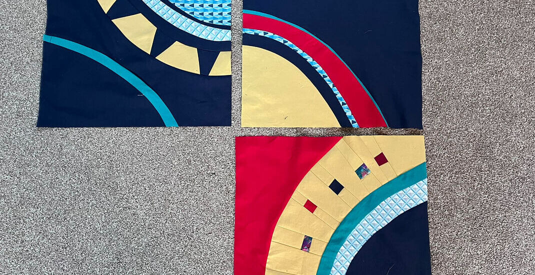Blocks made by Julie Roberts during the Fabulous Freehand Curves Cindy Grisdela Workshop held by the Modern Quilt Group in March 2025