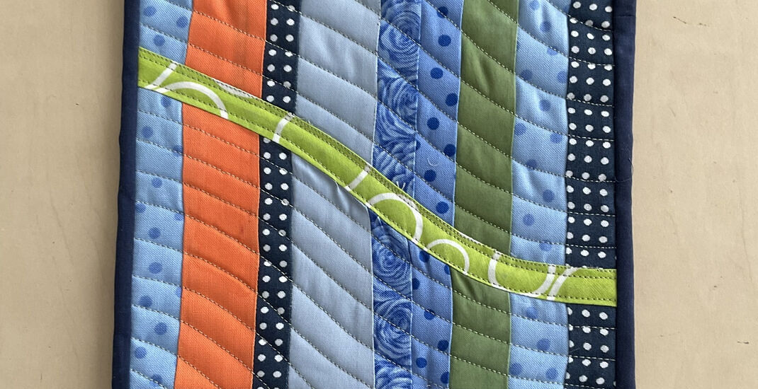 Take a line for a walk mini quilt by Pauline Warwick.