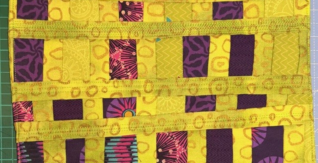 Take a line for a walk mini quilt by Dawn McGinty.