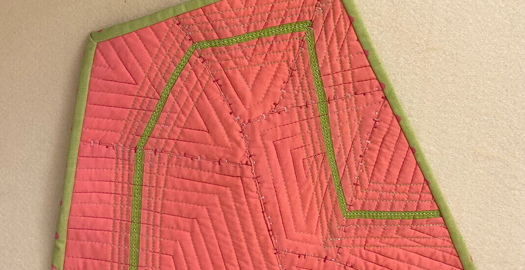 Take a line for a walk mini quilt by Muriel Markland.