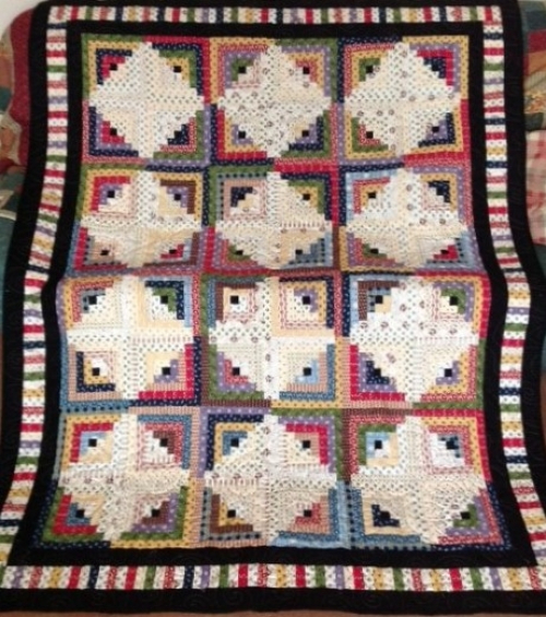 Log Cabin quilt by Jackie Smith using Devon County Fabrics.
