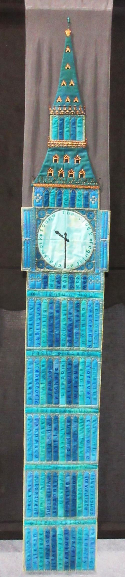 Long narrow quilt depicting a blue big ben