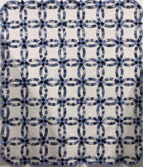 Traditional Wedding quilt: white with blue circles